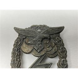 Two WW2 German Luftwaffe Ground Assault/Combat badges - one with flat pin and maker's mark M.u.K.; the other unmarked with round pin (2)