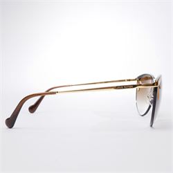 Louis Vuitton - pair of half-rim sunglasses, with gradient tinted lenses with pierced corners, silver and gold-tone frame, the temples signed ‘Louis Vuitton’, unused with original pouch, leather box, booklet and outer box