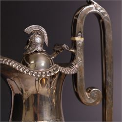 Early 20th century four piece silver tea service, comprising teapot, hot water pot, open sucrier and milk jug, all of oval bellied form with oblique gadrooned rim and upon four feet, the hotwater and teapot with wooden handles and finials, hallmarked William Lister & Sons, Sheffield 1912