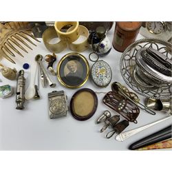 A group of assorted collectables, to include small oval purple guilloche enamel frame, WWII matchbox holder depicting Winston Churchill, Halcyon Days enamel box, Ronson table lighter, ebonised glove stretchers, ivory napkin ring, mother of pearl handled button hook, engine turned cigarette case, etc. 