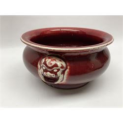 Qing Chinese Sang De Boeuf incense burner, Qing Dynasty, of bombe form with applied lion-mask handles, H11cm