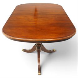 Georgian design mahogany twin pedestal extending dining table, rectangular rounded top on twin tripod pedestals with splayed supports, with additional leaf (W170cm D115cm H77cm); with set six (4+2) matching mahogany framed cameo-back dining chairs, upholstered in pale yellow lozenge patterned fabric (W57cm H94cm)