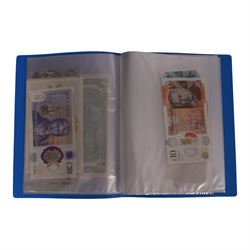 Great British and World banknotes, including many uncirculated examples, housed in ten folders