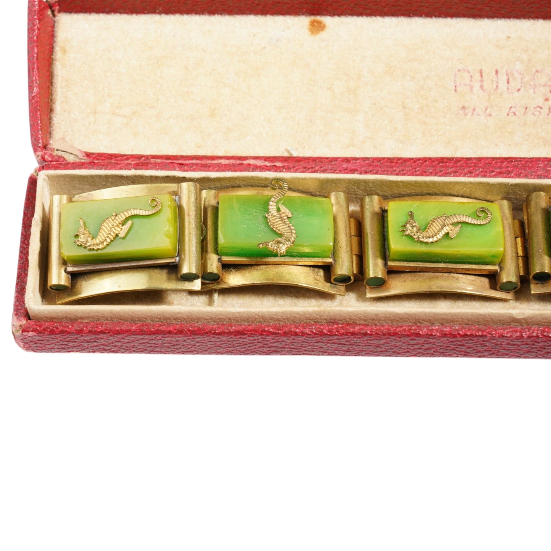 French Art Deco gilt metal and bakelite seahorse bracelet attributed to Jean Painleve, with matching clip