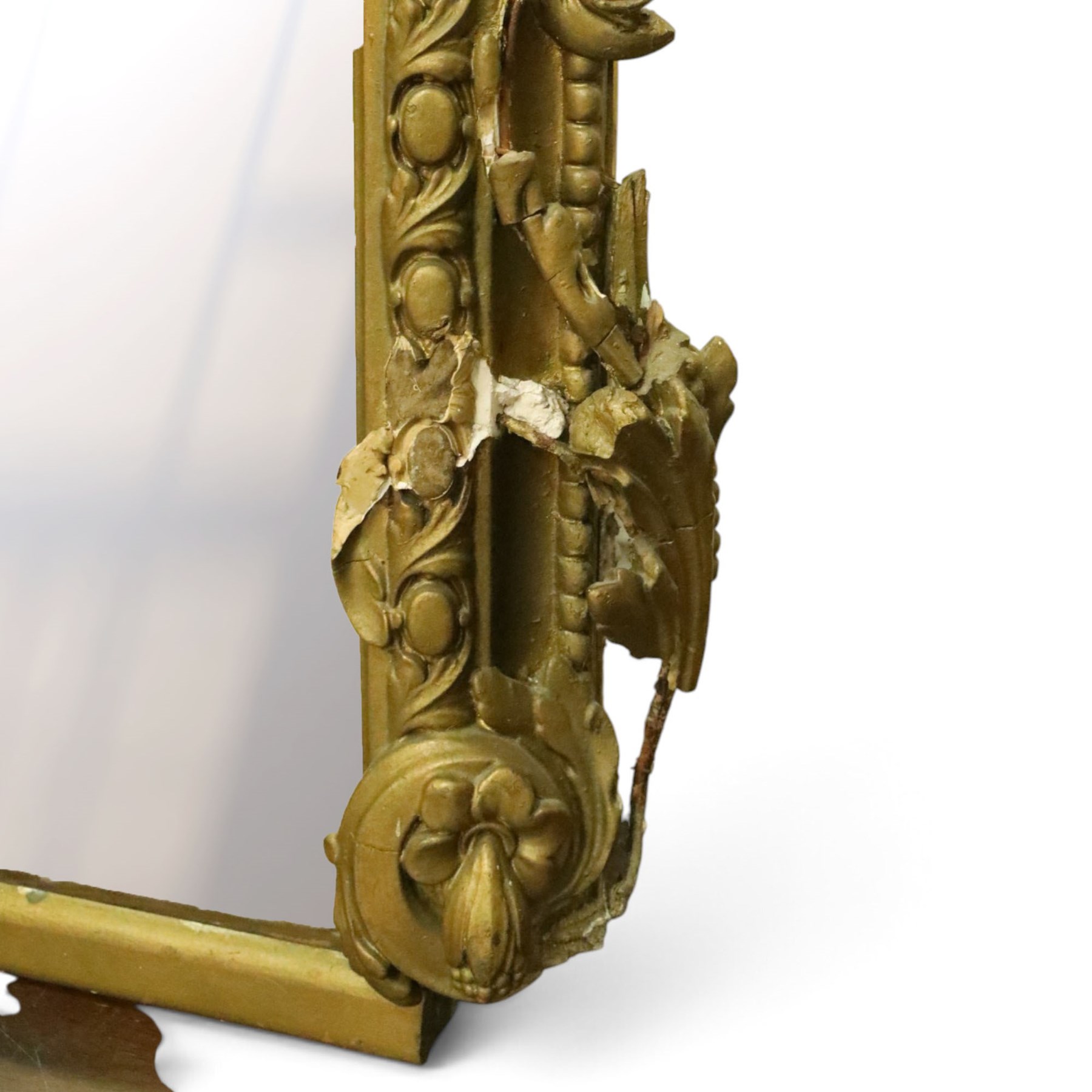 Large Country House late 19th century gilt framed overmantel mirror of arched form, the cartouche and scallop shell pediment over an egg-and-dart and beaded frame, the lower spandrels of scrolling foliate form with acanthus and flower head motifs