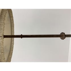 Early 20th century oak standard lamp, tapered column with bead and carved decoration, on a circular moulded platform base, with shade decorated with birds, H153cm (measurement excluding fitting and shade)