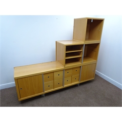  Modern beech split-level staggered wall unit, two adjustable shelves, eight drawers, two cupboards, W193cm, H164cm, D47cm  