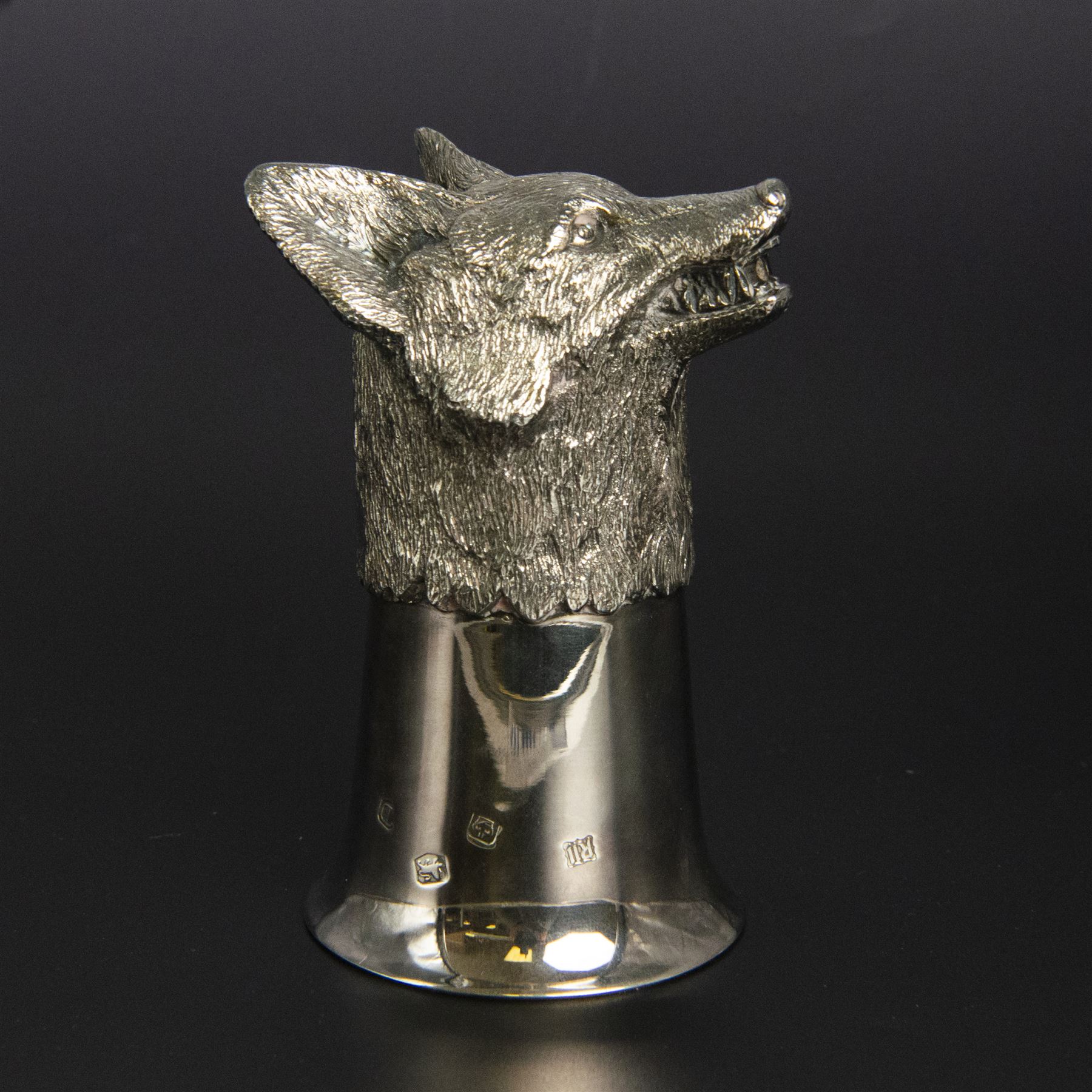 Late 20th century silver stirrup cup, modelled as a fox head to a cup of plain fluted form, hallmarked Royal Irish Silver Co, Sheffield 1971, H11.5cm