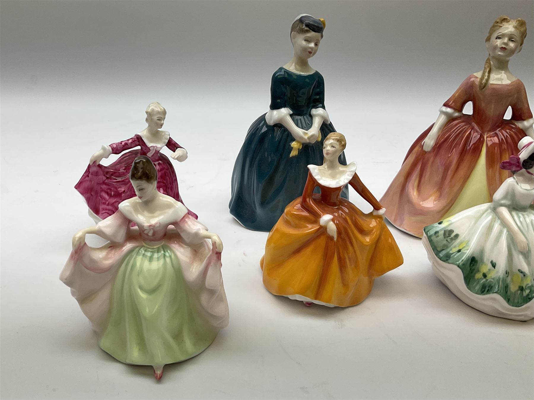 Royal Doulton Peggy Davies collection figures including Cherie HN2341, Debbie HN2400 and Royal Doulton miniature figures, Kirsty HN3213, Sunday Best HN3218, Sara HN3219, Ninette HN3215, Buttercup HN3908 and Fragrance HN3220.