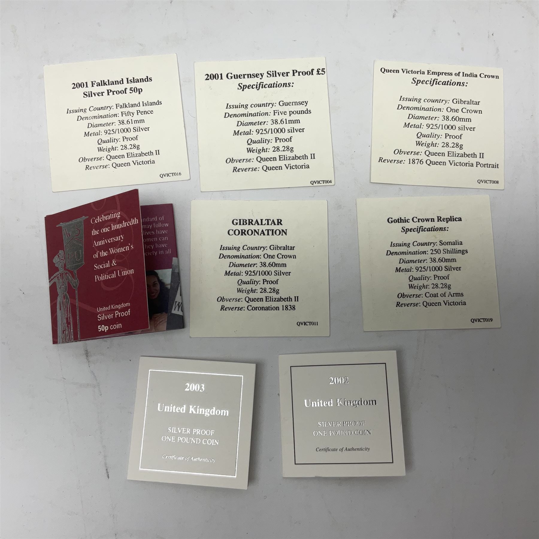 Thirteen silver coins, including Queen Elizabeth II Solomon Islands 2002 sterling silver five dollars, Alderney 2002 sterling silver five pounds, Fiji 2002 sterling silver ten dollars, United Kingdom 2003 one ounce fine silver Britannia, 2003 'Give Women The Vote' fifty pence etc, all with some form of certificate