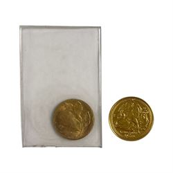 Queen Elizabeth II Isle of Man 2011 gold one sixty-fourth Angel coin, and a small base metal coin
