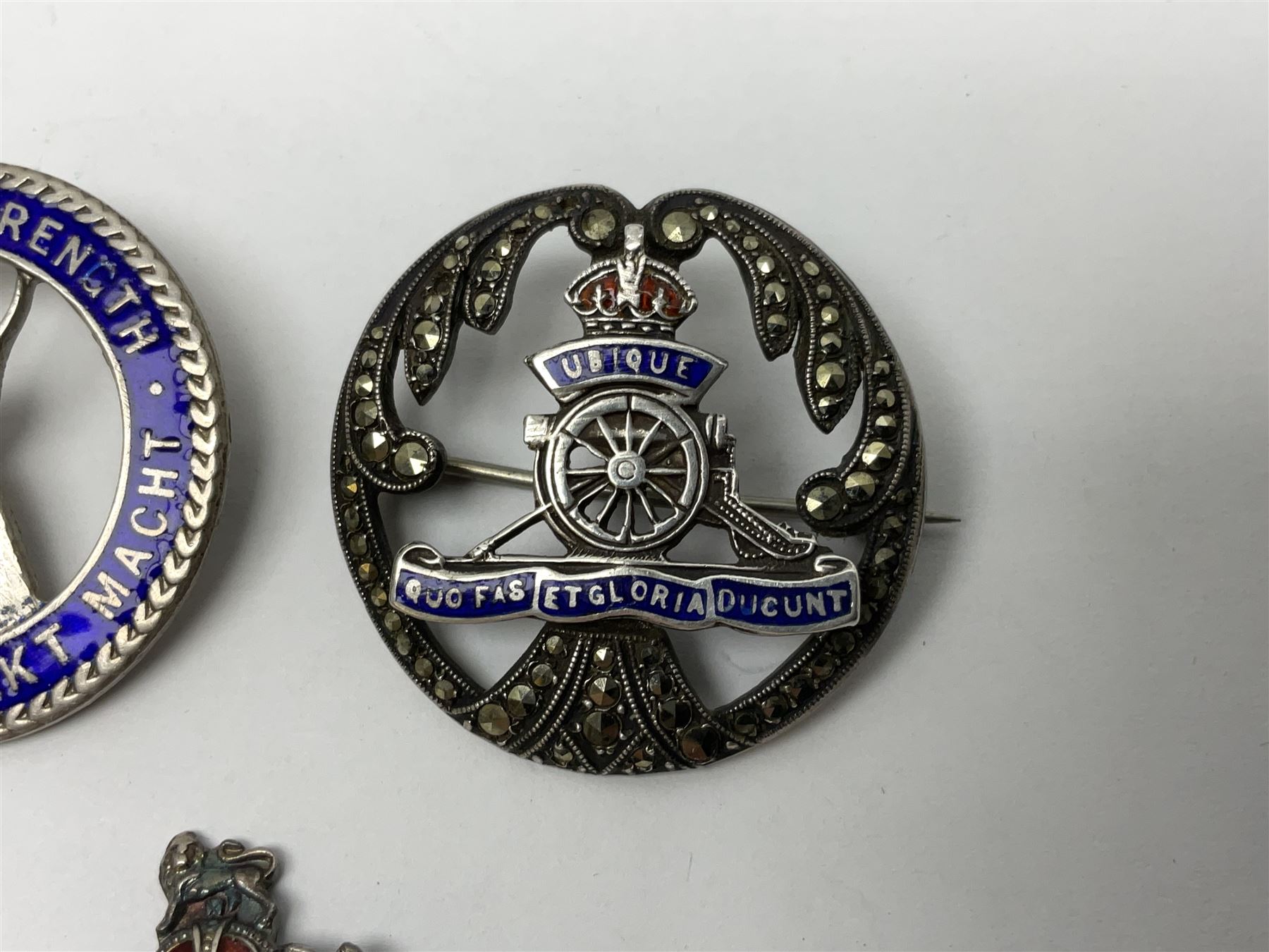 Five silver sweetheart brooches - Royal Artillery with marcasite, Naval with marcasite, George VI Royal Engineers with tortoiseshell, Royal Marines Gibraltar with enamel and South African General Service with blue enamel (5)