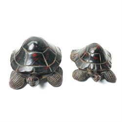 Set of four Asian carved and lacquered graduated ornamental turtles, largest L30cm