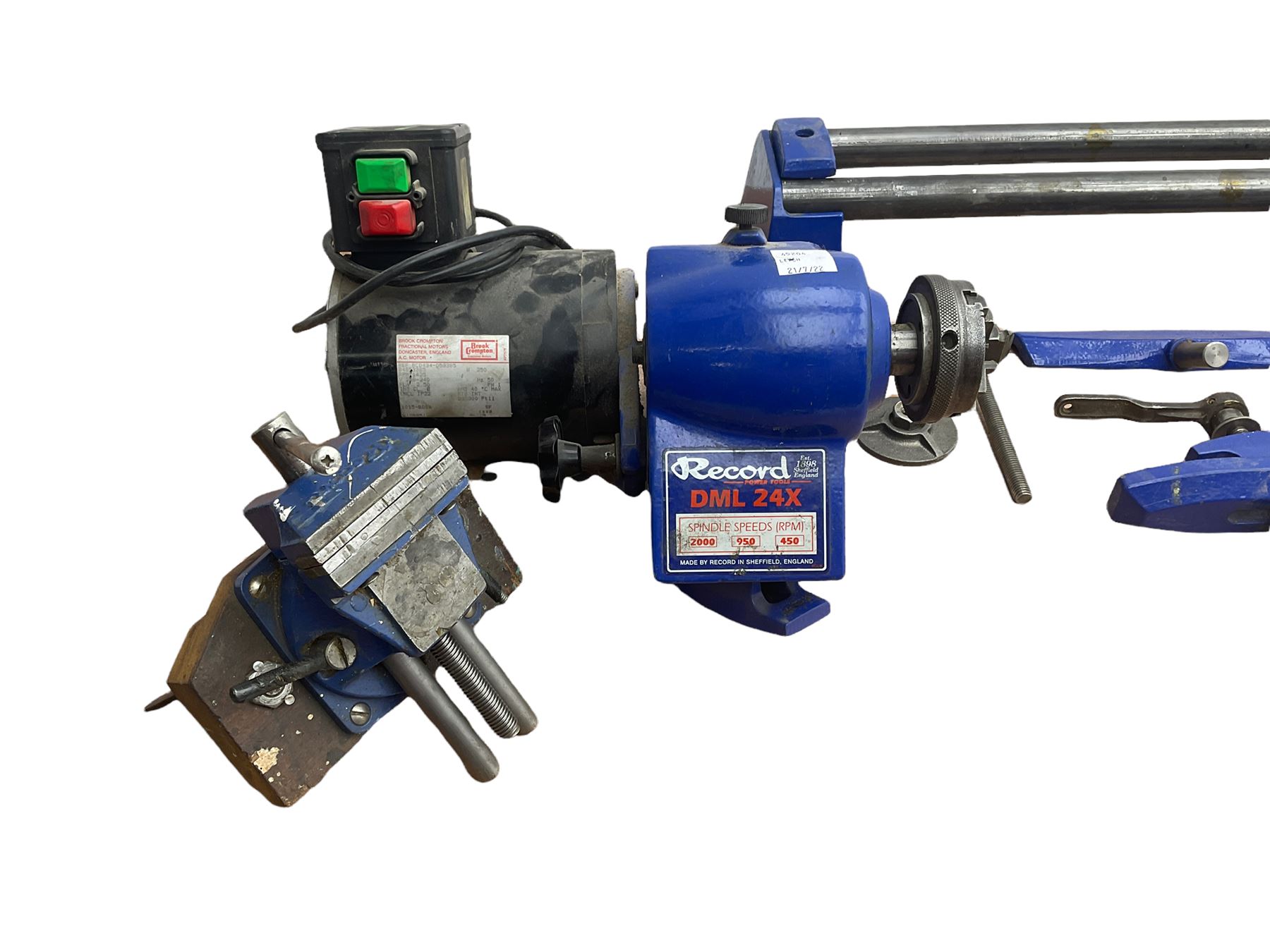 Record wood turning lathe and motor, with a three jaw chuck, tailstock and tool rest, selection of wood turning and woodworking chisels, electric bench grinder with grinding wheel and collet chuck plus a Record bench vice.