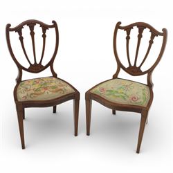 Edwardian pair of satinwood inlaid shield back chairs, the pierced shield shaped backs wit...