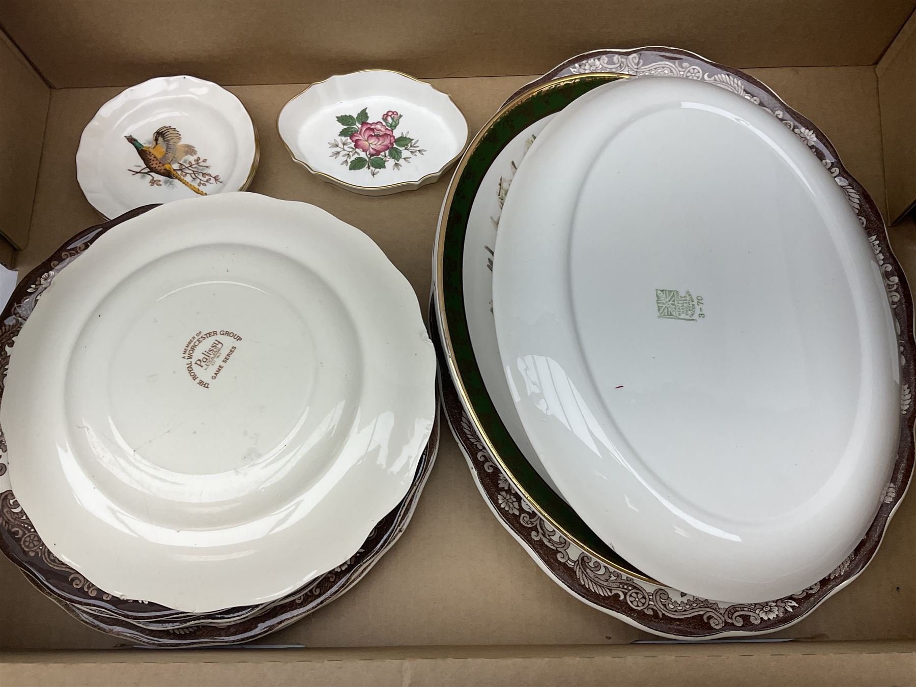 Eight Royal Worcester Palissy Game series dinner plates and one