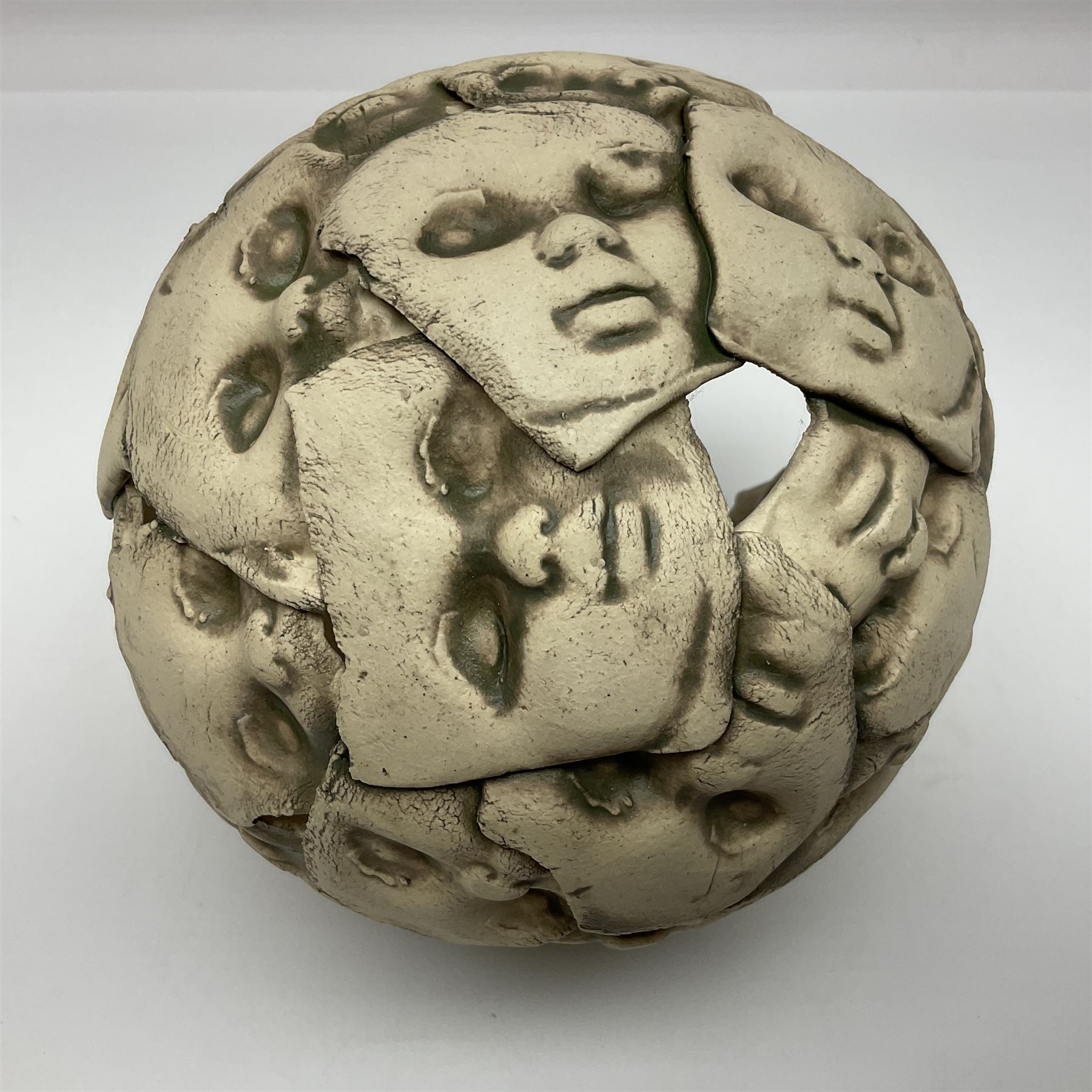 Studio pottery bowl, decorated with faces and a green glaze finish, H18cm 