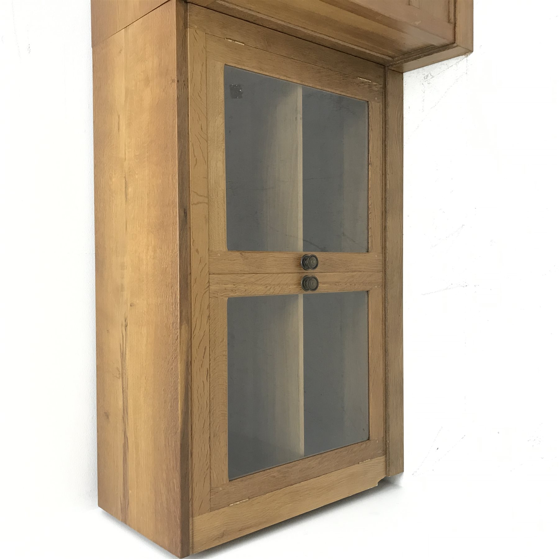 'Lizardman' oak kneehole desk fitted with six drawers and two glazed bookcases, by Derek Slater of Crayke, W347cm, H72cm, D61cm