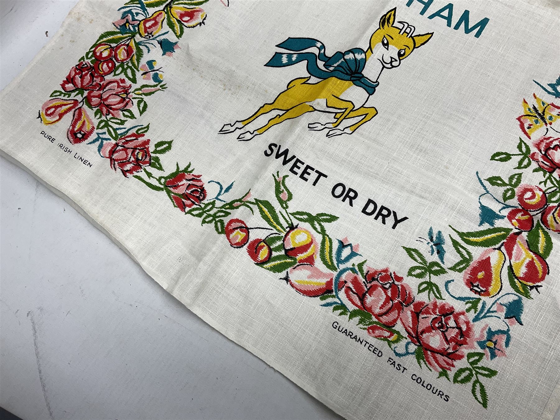 Breweriana; Eight Babycham glasses together with a Babycham plastic fawn mascot and linen I'd Love a Babycham tea towel