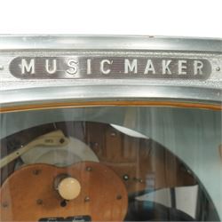 Ditchburn - 'Music Maker Panoramic 200' jukebox circa 1959, curved panoramic glazed front offering full view of the automatic selection process, accommodating 100 records (200 selections), with a stereo sound system, the aluminium trim over a woven speaker grille with an all-over ebonised and silver finish