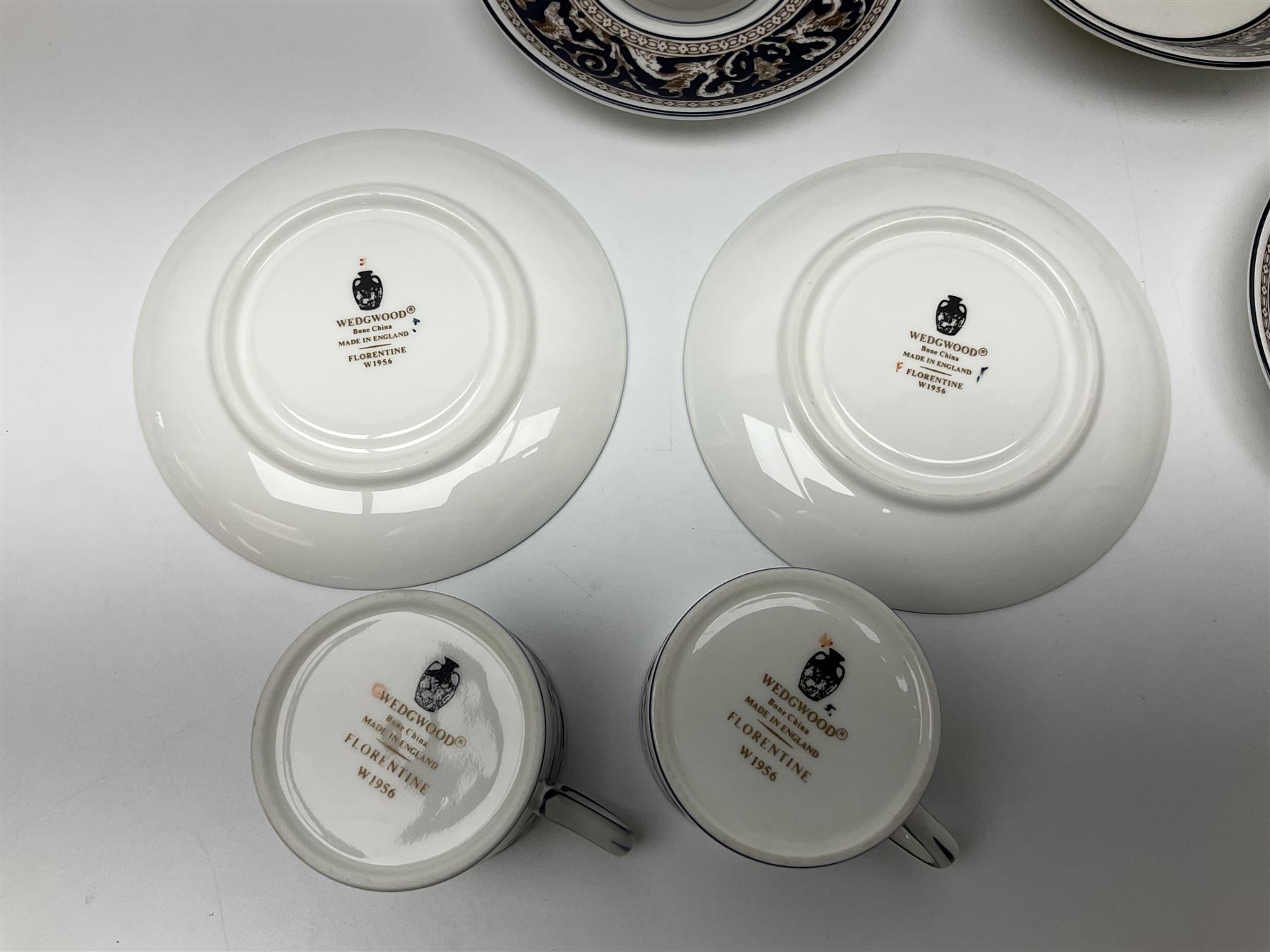 Wedgwood navy Florentine pattern coffee service for six, comprising coffeepot, coffee cans and saucers, milk jug, twin handled covered sucrier and small dish