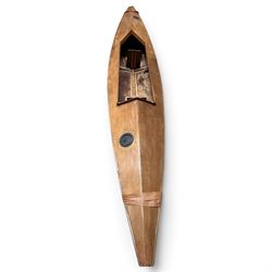 Mid-20th century varnished marine plywood two-person touring kayak, the decked hull with pointed bow and stern, two circular Holt-Allen access hatches and central open cockpit fitted with seats