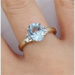 18ct white gold oval aquamarine ring, with baguette diamond shoulders, hallmarked
