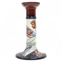 Pair of Moorcroft candlesticks, decorated in the Red Tulip pattern by Sally Tuffin, impressed and painted marks to bases, H21cm (2)