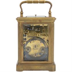 French-19th century 8-day carriage clock in a corniche case, two train striking movement with repeat work and alarm, enamel dial with Roman numerals and five minute Arabic’s, spade hands and alarm setting dial, movement with a lever platform escapement sounding the hours and alarm on a gong. With original case and key.