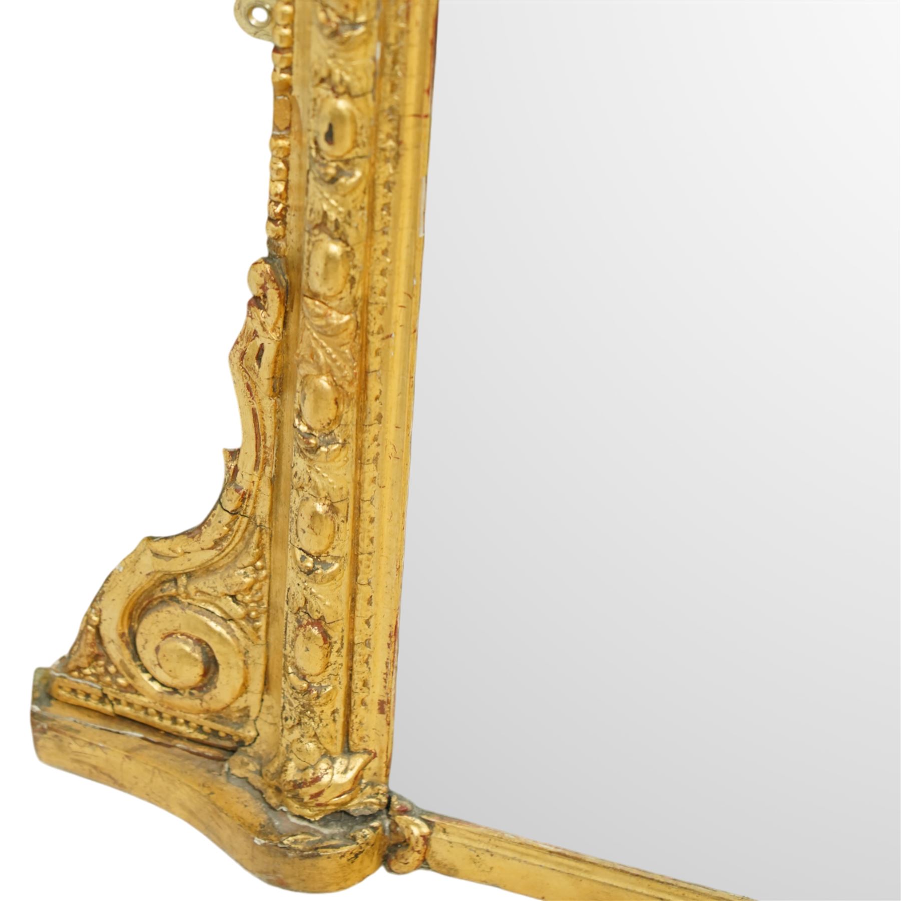 Victorian giltwood rococo revival overmantel mirror, arched top with plume crest of scrolling acanthus leaves flanked by symmetrical foliate scrolls 