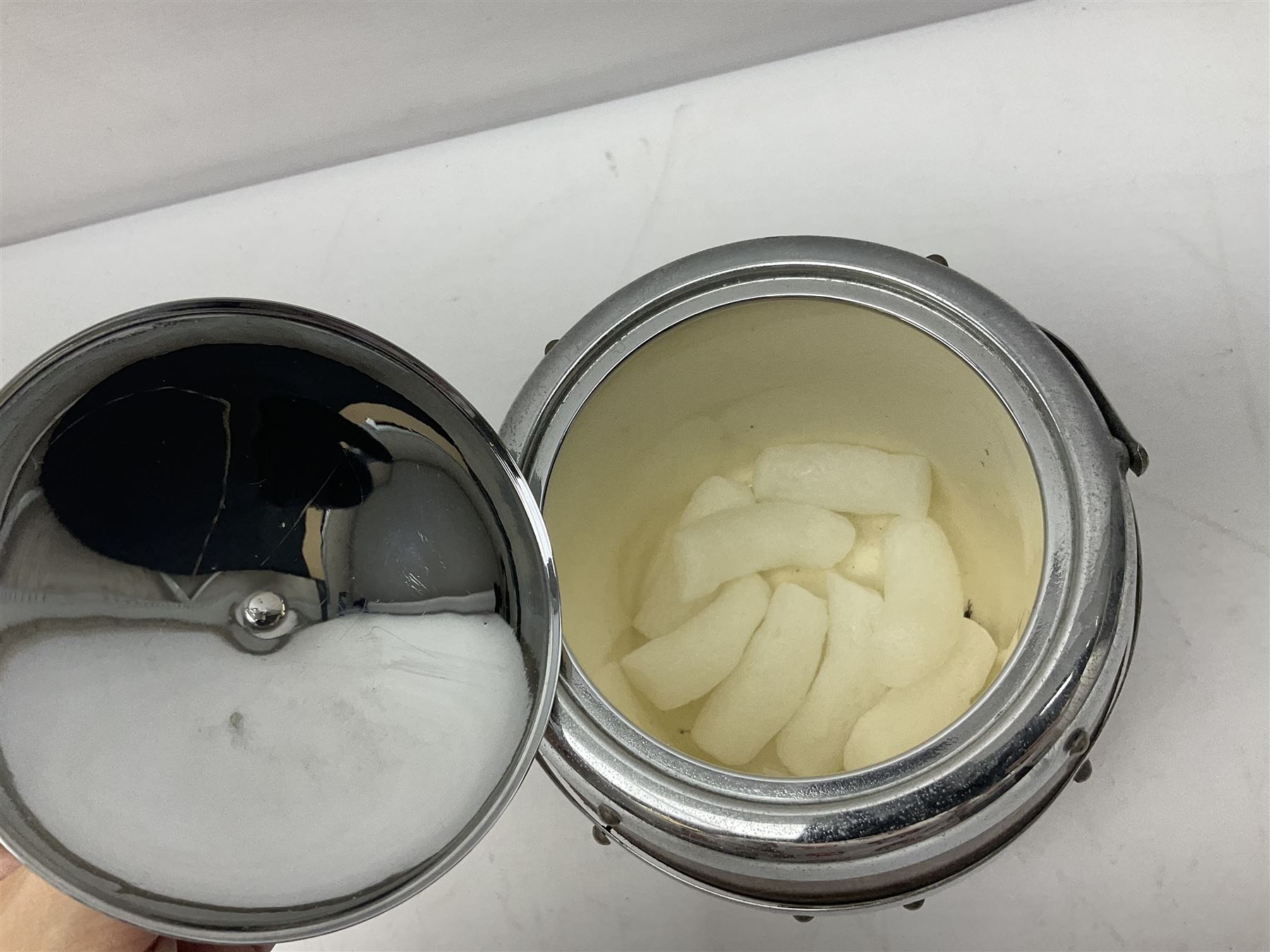 Five early 20th century biscuit barrels with silver-plated mounts
