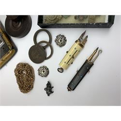 A group of assorted collectables, to include two silver buttons, hallmarked Birmingham 1900, Stanhope pendant in the form of a pig, two turquoise inset etuis (lacking covers), sugar loaf cutters, wick trimmers, pastry wheel, selection of metal detector finds, red wax document seals, one example in circular rosewood box, two treen snuff boxes, riding boot hooks, leather cased tailors scissors, wax model of a praying figure within a glass dome, letter head stamp press, etc. 