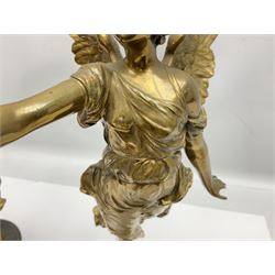 After Oswald Schimmelpfennig (German, 1872-1939): Pair of gilt bronze winged Allegorical female figures, the first example with arm outstretched holding a branch, signed 'Schimmelpfennig 1900', the second with arm raised above her head holding a book and sword in the other, both raised upon marble plinths, H45cm