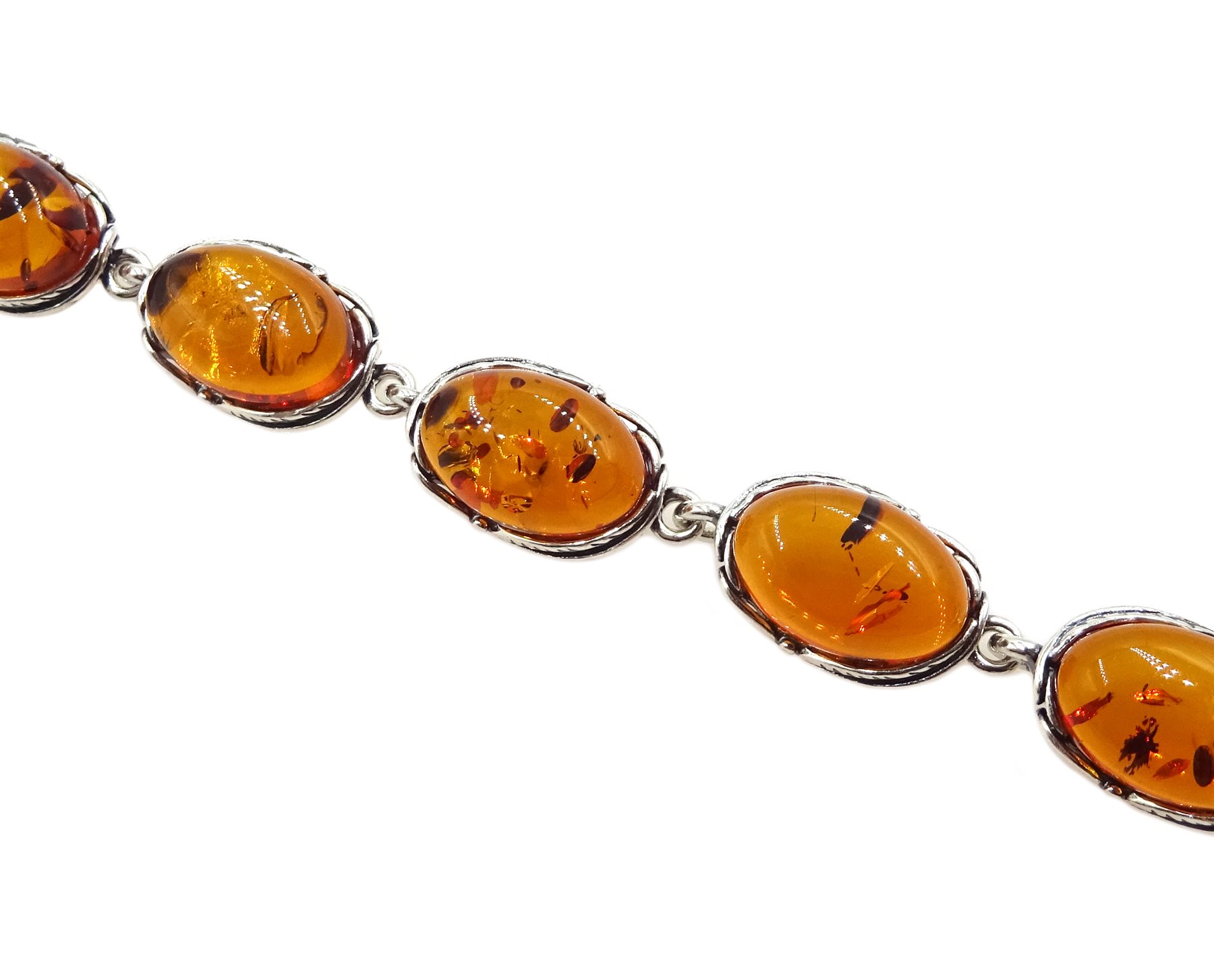 Silver oval Baltic amber link bracelet, stamped 925