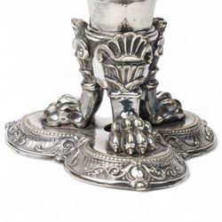 19th century silver plated vase of tapering form with lappet border and three caryatid handles surrounded with laurel wreath cartouches raised on triple paw feet on lobed base H28cm