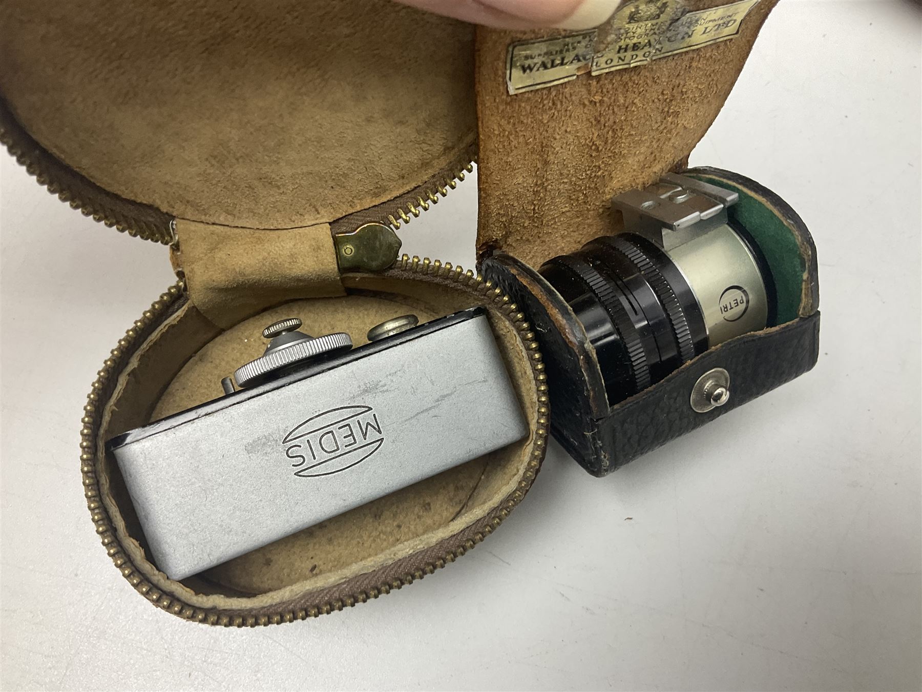 Collection of camera bodies and lenses, to include Olympus OM-1 camera body, serial no 106567, with 'Olympus OM-System F.Zuiko Auto-S 1:1.8 f=50mm' lens, serial no 135097,  Zenit-B camera body, serial no 71017867, with 'Helios-44-2 2/58' serial no 7500040, Voigtlander Vito B camera body, with 'Voigtlander Colour Skopar 1:2.8/50' lens, 'Olympus OM-System Zuiko Auto-Zoom 1:4 f=75-150mm' lens serial no 104321, 'Tamron SP 35-210mm 1:3.5-4.2' lens etc 