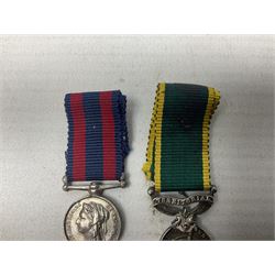 George V Military Medal and Distinguished Conduct Medal miniature group of seven medals comprising MM, DCM, WW1 trio including 1914 Star with date clasp and MID leaves, The Great Durbar Delhi 1911 Medal and LSGC; on pinned wearing bar; WW1 Military Medal miniature group of three comprising MM, BWM and Victory; Victoria North West Canada 1885 miniature; and George VI miniature Territorial Efficiency medal; all with ribbons