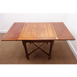  Early 20th century oak drawer leaf dining table, barley twist supports, 'X' shaped stretchers, 137cm x76cm, H74cm  