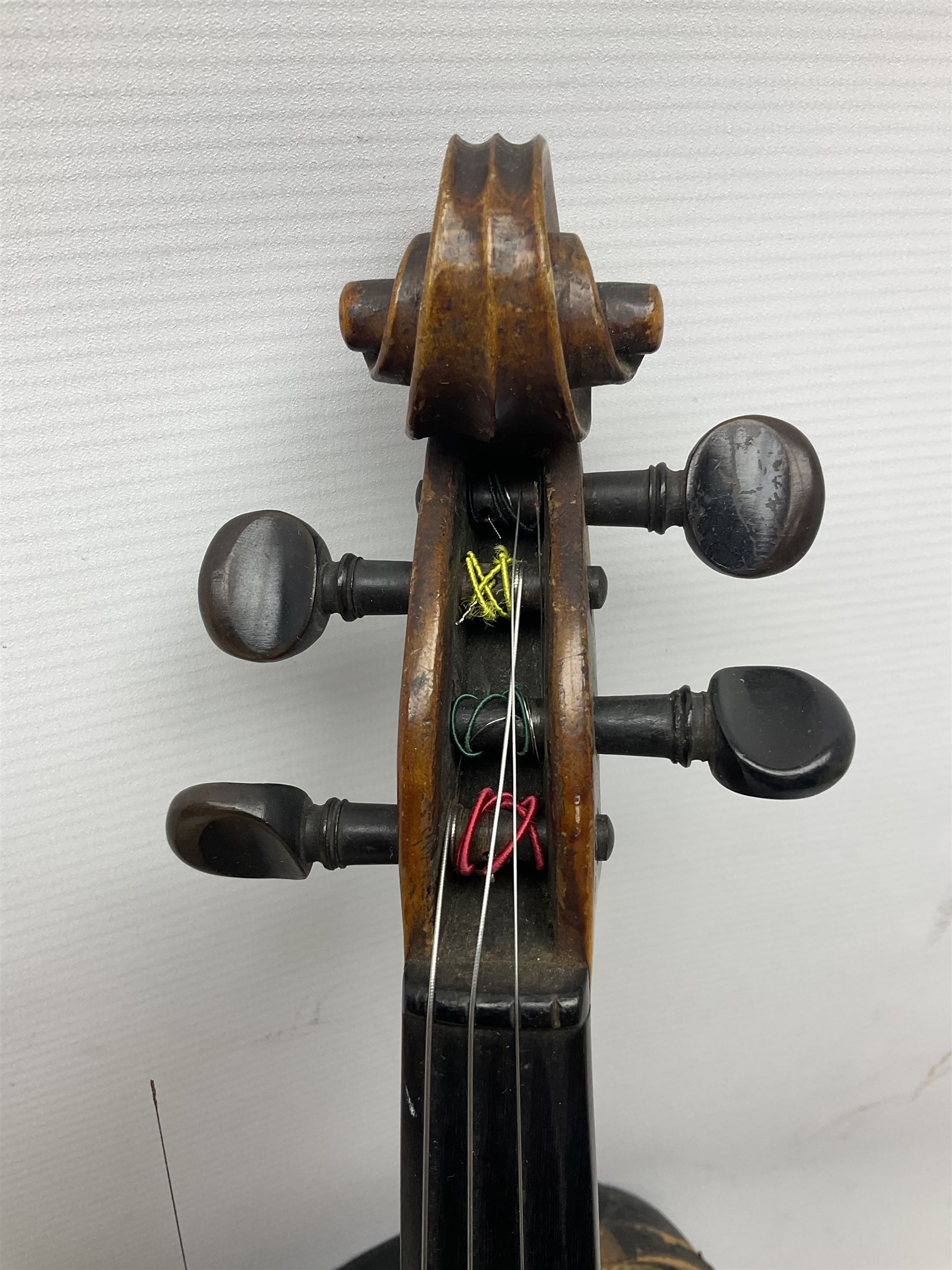 German copy of a Maggini violin c1900 with 35.5cm two-piece maple back and ribs and spruce top, bears label 'Maggini Deutsche Arbeit 1866' L59cm; in carrying case with bow