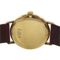 Manis gentleman's 9ct gold manual wind wristwatch, hallmarked, on tan leather strap and a silver cylinder ladies fob pocket watch, the case with embossed floral decoration