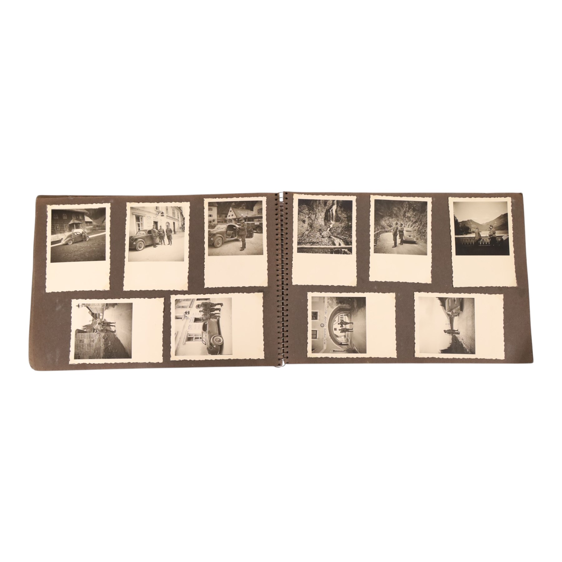 WWII German Soldiers photo album, 1942, including photographs of soldiers in uniform posing during parade etc  
