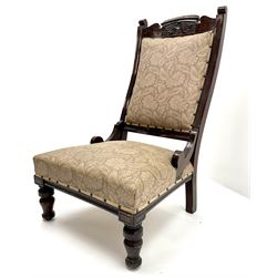 Victorian mahogany framed nursing chair, shaped and carved cresting rail, upholstered back and seat, turned supports 