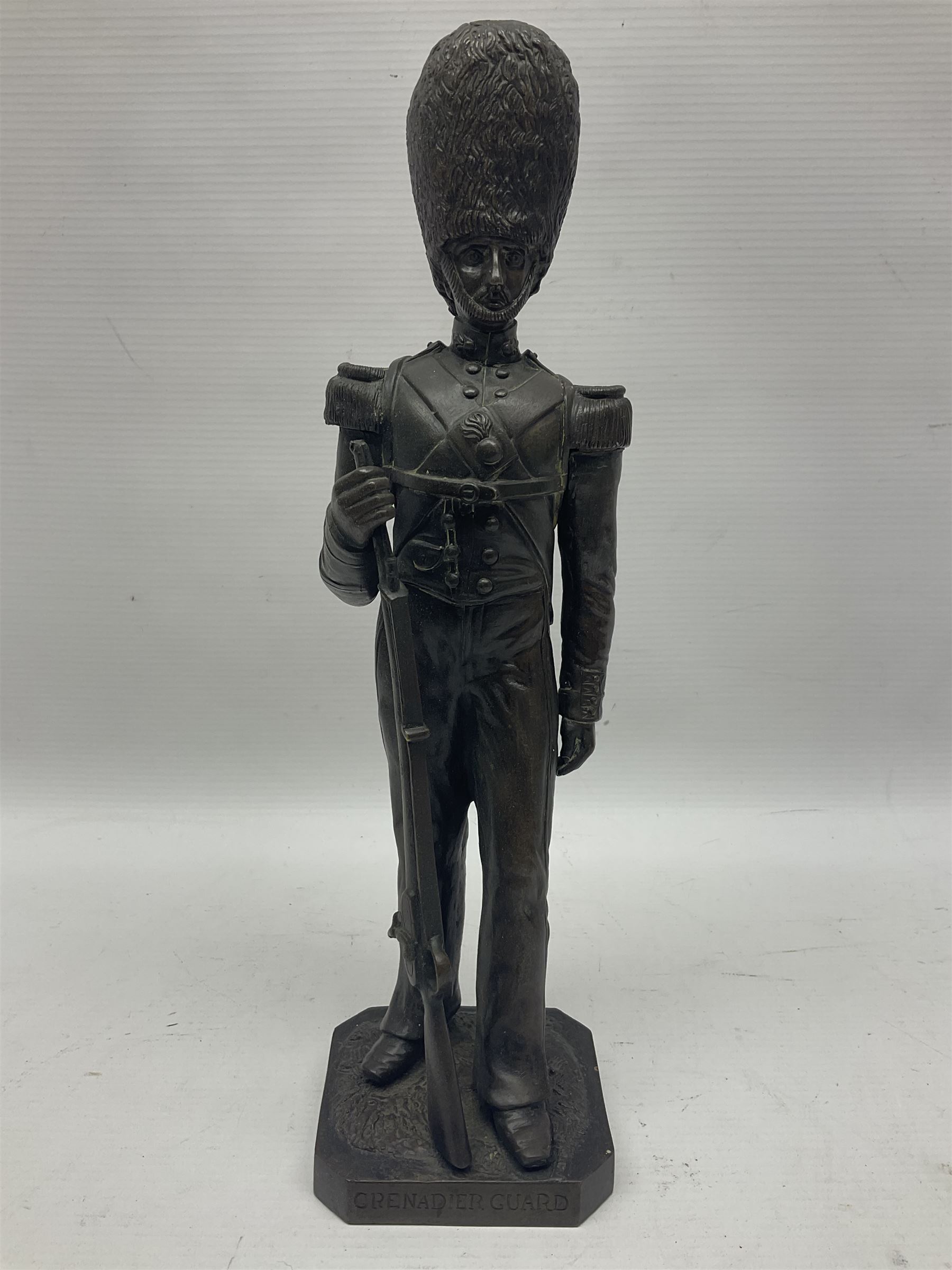 Bronzed figure of a Grenadier guard, H33cm