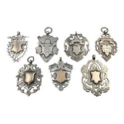 Seven Edwardian and later silver cartouc