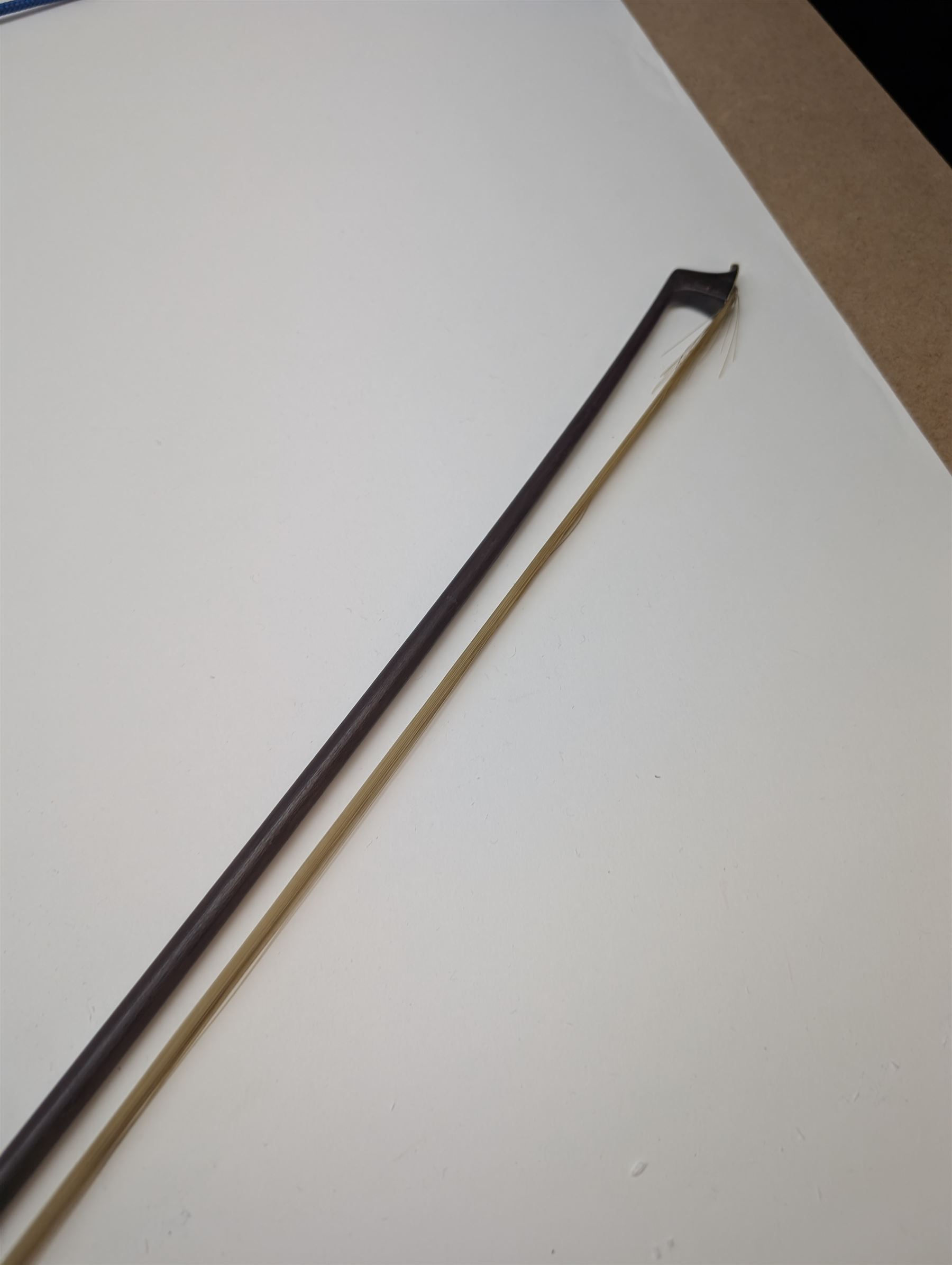 Late 19th century full size German violin with a  Wolff Brothers label, scroll with ebony pegs, finger board and tail piece, in a hard case with bow. Length 60cm

This item has been registered for sale under Section 10 of the APHA Ivory Act