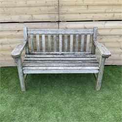 Solid teak two seat garden bench  - THIS LOT IS TO BE COLLECTED BY APPOINTMENT FROM DUGGLEBY STORAGE, GREAT HILL, EASTFIELD, SCARBOROUGH, YO11 3TX