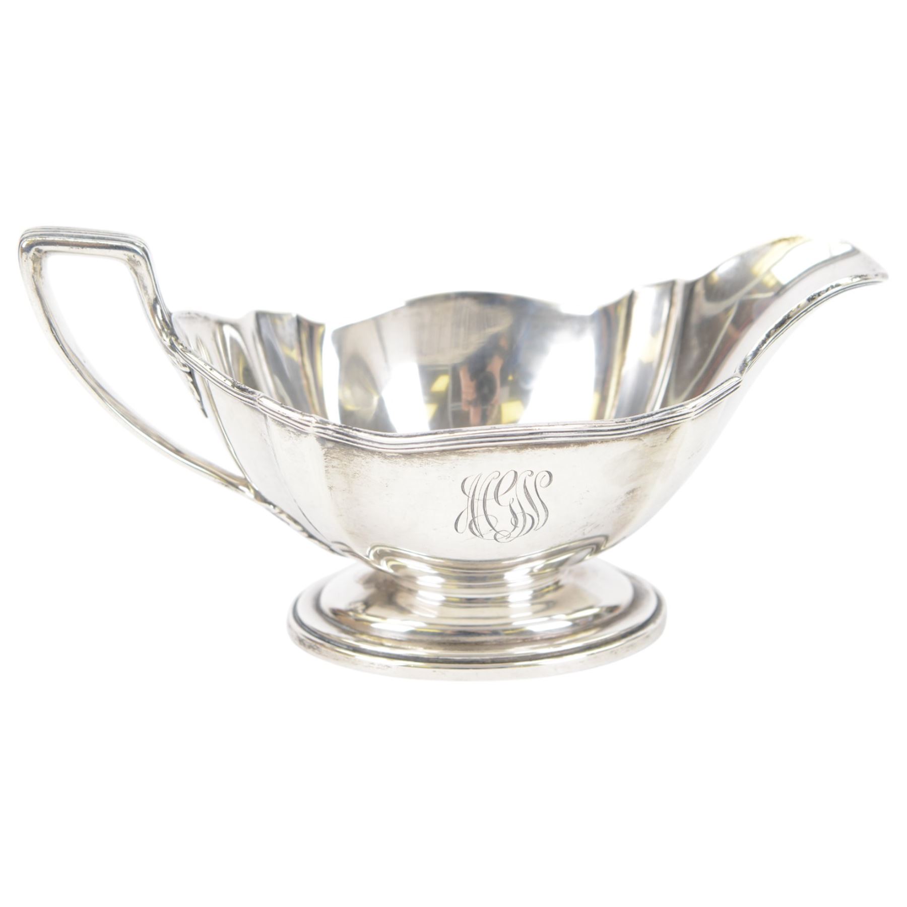 American silver sauce boat, with shaped rim and engraved to body with monogram, upon oval stepped foot, stamped Sterling and with maker's marks for Gorham, H9.5cm