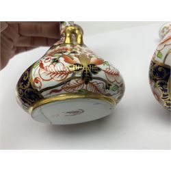 Pair of Royal Crown Derby 6299 imari pattern miniature vases, together with a miniature pitcher and dish in 2451 imari pattern, all with printed marks beneath, vase H12cm 