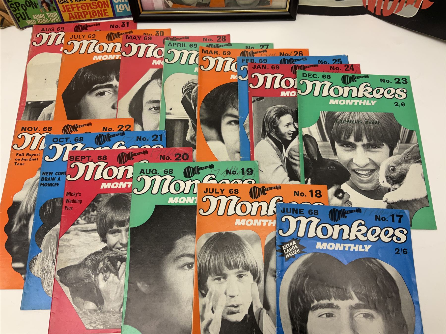 Monkees memorabilia - 'Monkees Monthly' magazine almost complete run from No.1 Feb 67 to No.31 Aug 69 (lacking nos.29 and 32); the cover of No.1 signed by all four members of the group during their 1997 Reunion Tour; quantity of A&BC bubble gum cards; programme for their only UK live performance in 1967 at Empire Pool Wembley; and other related late 1960s music magazines/paperback book