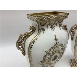 Pair of Copelands enamel jeweled twin handle vases, each decorated with a seated female figures, makers mark beneath, H22cm